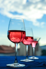 wine glasses with blue sky