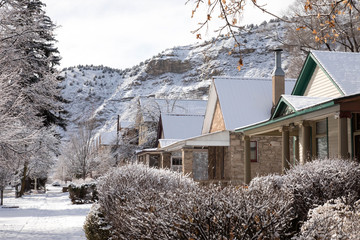 Line of Victorian brick homes covered in snow in downtown Durango, Colorado