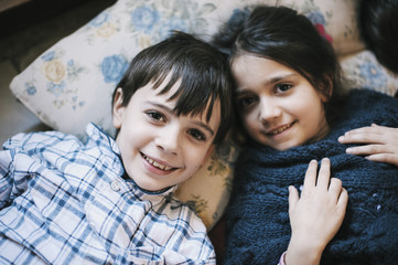 portrait of brothers in pajamas at home