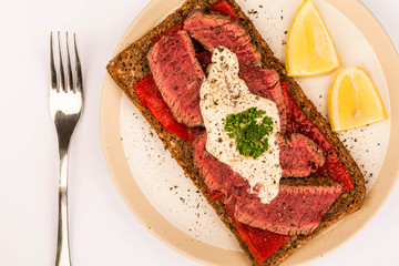 Rare Cooked Beef Steak And Red Pepper Open Face Sandwich With Horseradish Sauce