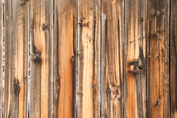 Multi-hued wood fence, full frame