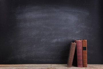 Education and reading concept - group of books on the wooden table
