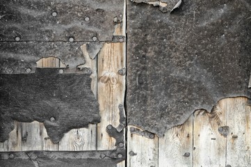 Close-up of old damaged wooden door
