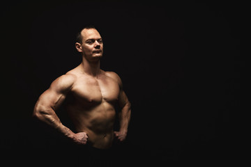 Fototapeta premium Strong athletic man showes naked muscular body