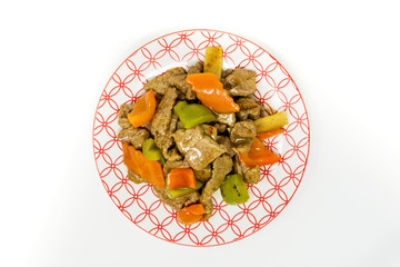 wok fried chicken stir fry with sweet peppers and chinese vegetables