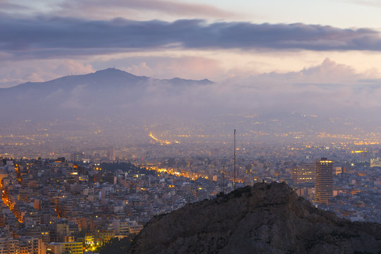 View of Athens from Lycabettus hill at dawn, Greece. 
