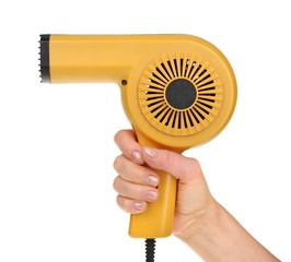 Hand holding an old hairdryer isolated on white background