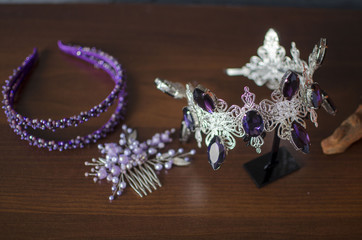 Beautiful silver color fashion crown with violet gemstones. Purple diadema royalty jewelry with headband