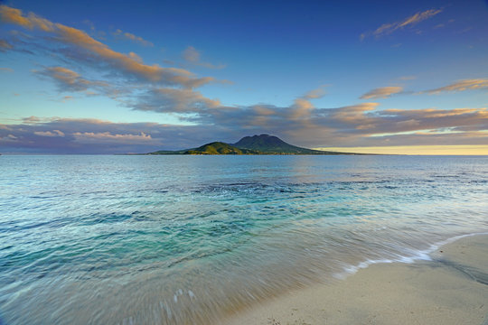 View of the Nevis Peak volcano across the water from St Kitts