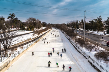 OTTAWA, ONTARIO / CANADA - JANUARY 20  2018: PEOPLE SKATING ON RIDEAU CANAL