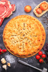 Ossetia pie with meat and vegetables