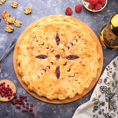 Ossetia pie with fruits apples cherry
