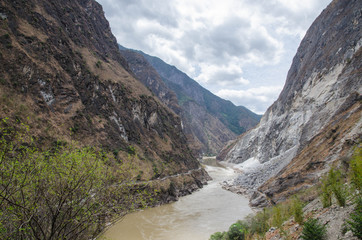 The torrential flow through the hills in Tibet