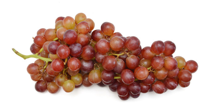 red grapes over white background