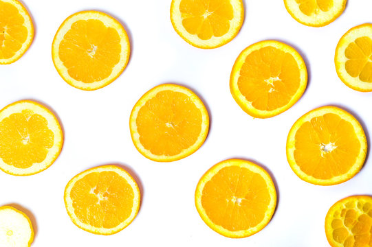 Sliced oranges and lemon background pattern isolated