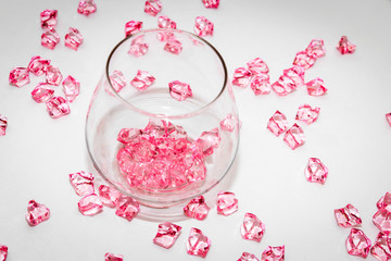Pink jewelry in glass decorative