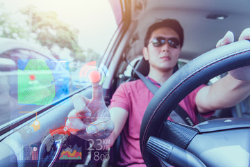 asian male drive smart car with touch screen future concept driver assistant