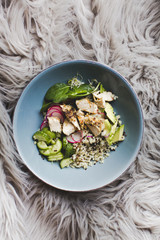 Healthy Quinoa Bulgur bowl with vegetables and chicken