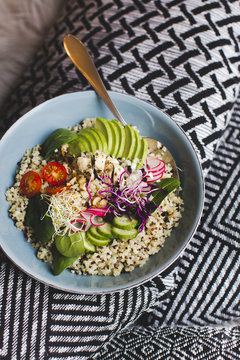 Healthy Quinoa Bulgur bowl with vegetables and chicken