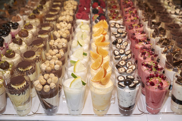 Small glasses with ice cream dessert