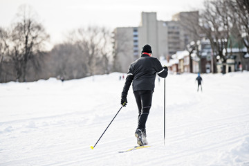 Senior man skiing on snow