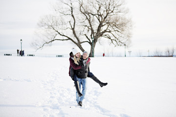 Young couple outside in winter