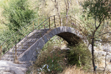 A bridge over a stream.