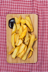Golden French fries potatoes ready to be eaten