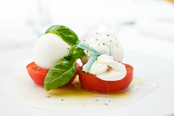 Mozarella cheese with tomatoes
