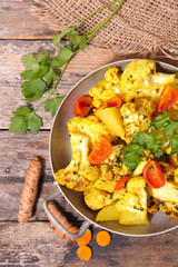 baked cauliflower with cream and vegetable