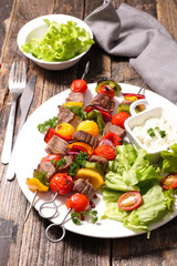 fried beef and salad