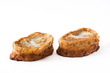 Traditional homemade Spanish torrijas isolated on white background. Easter dessert.

