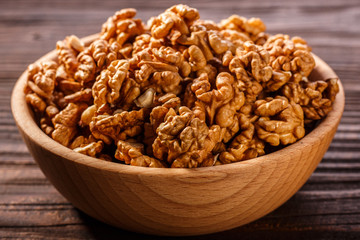 Walnut on a dark rustic wooden background