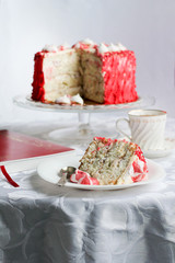 Red homemade cake decorated by hearts.