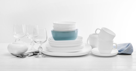 White square dinnerware set with glasses
