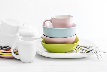 Ceramic bowls with silver cutlery