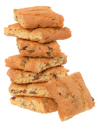 Appetizing chip cookies with raisins and candied fruit tower isolated