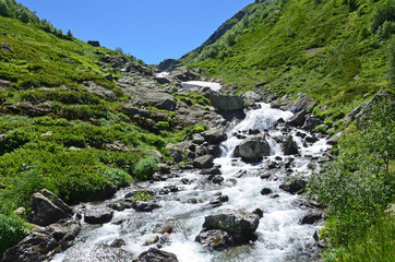 Fototapeta na wymiar Имеретинский водопад летом в солнечный день, Западный Кавказ