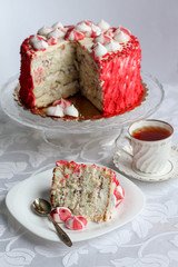 Red homemade cake decorated by hearts.