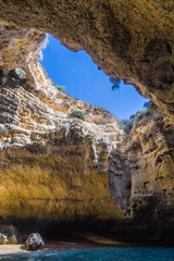 Limestone cave, open sky view on the Algarve, Portugal