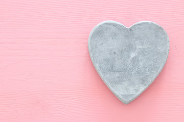 Valentine's day concept. heart over pastel pink background. Top view.