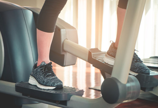 Foot working out on stepper exercise machine
