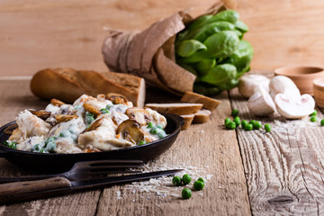 Chicken and mushroom casserole in cast iron skillet