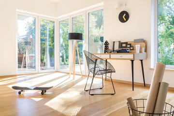 Skateboard in bright workspace