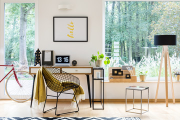Wooden lamp in workspace