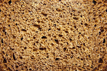 The texture of black bread. Black bread is photographed close up