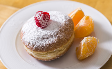 Berlin buns with raspberries