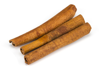 Cinnamon sticks isolated on white background. Top view