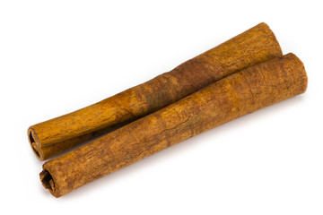 Cinnamon sticks isolated on white background. Top view