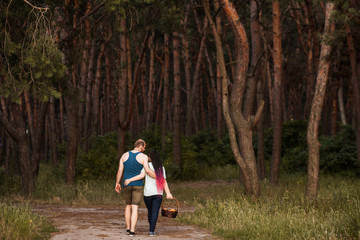 Couple walk forest picnic love concept. Hiker lifestyle. Together on the nature.